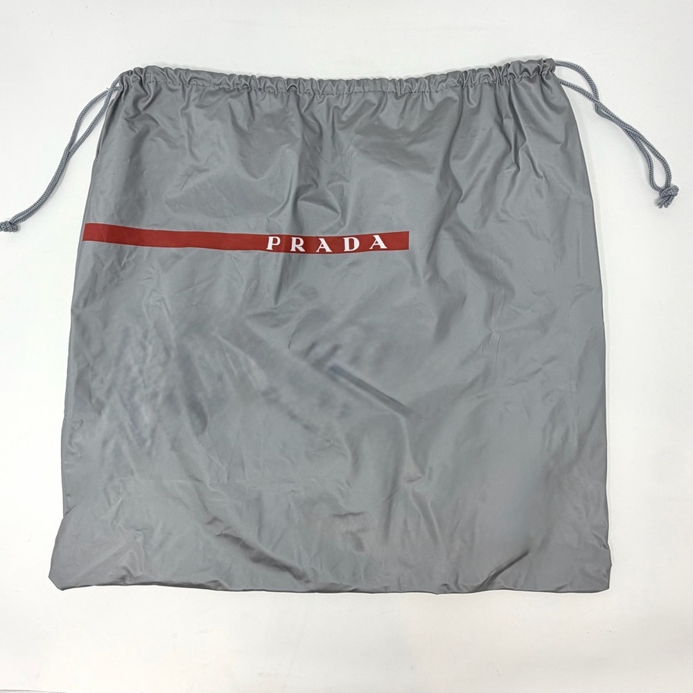 Prada Gray Bag with Red Logo Stripe